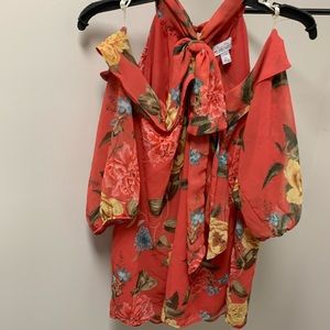 Off the shoulder with button neck with bow tie.